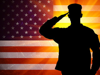 Veteran in front of flag